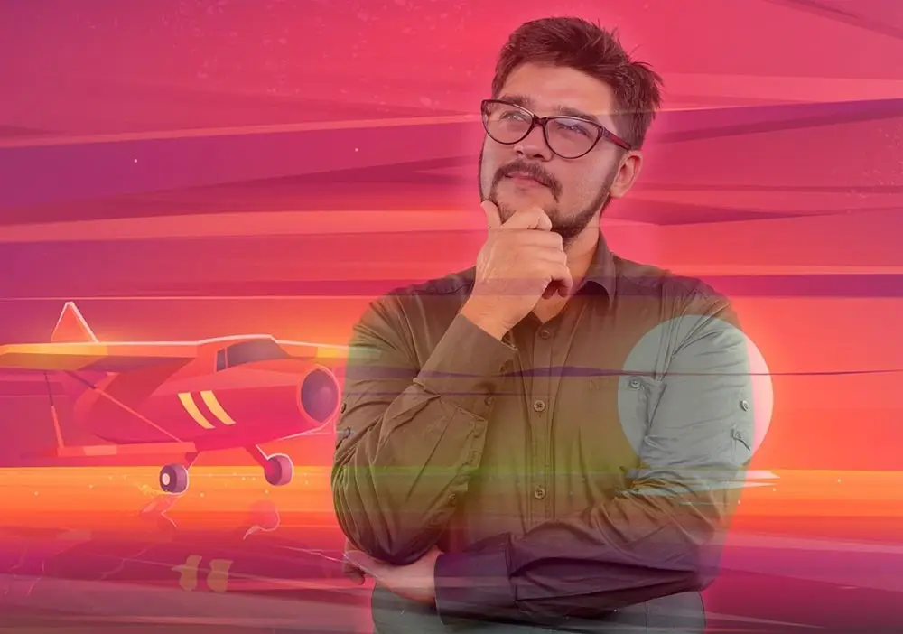 Man in glasses deciding where to play Aviator gambling game with red airplane and sunset background.